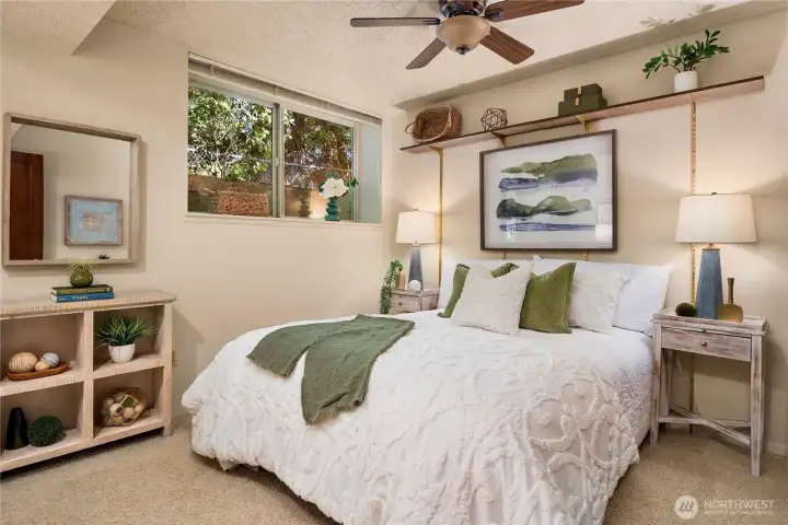 Inviting guest bedroom downstairs, a peaceful retreat for family or visitors.