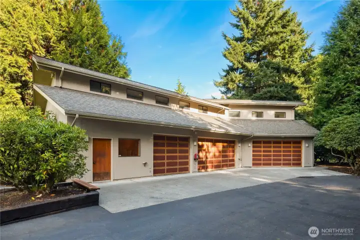 A true rarity: this expansive detached structure offers covered parking for seven (7) vehicles plus endless possibilities for work, creativity, and play. Designed for flexibility, it’s ideal as a car enthusiast’s showcase, studio, workshop, home gym, or future guest suite.