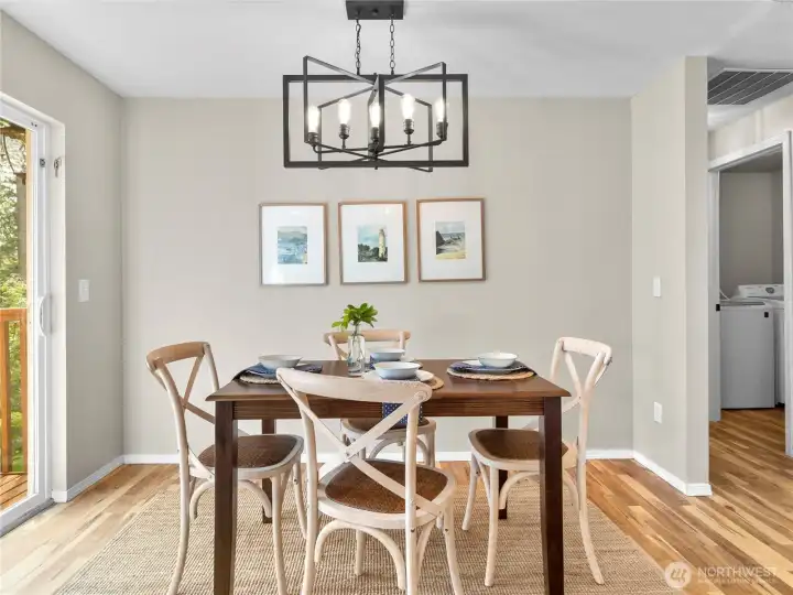 Gather for meals or entertaining in this open dining space that connects effortlessly to the outdoors.