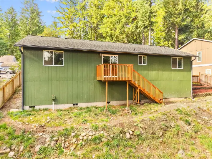 Private backyard retreat with plenty of space for gatherings or play.