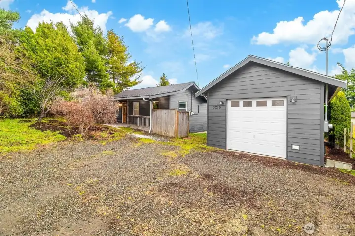 Charming single-level home with detached garage and private driveway