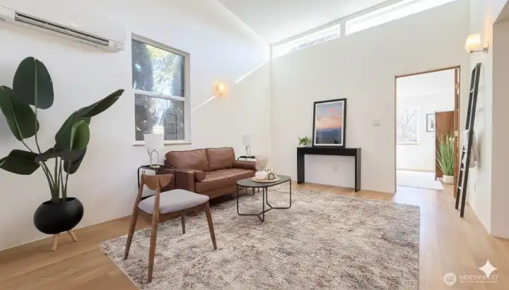 Living room w/ Vaulted Ceiling and Clerestory Windows