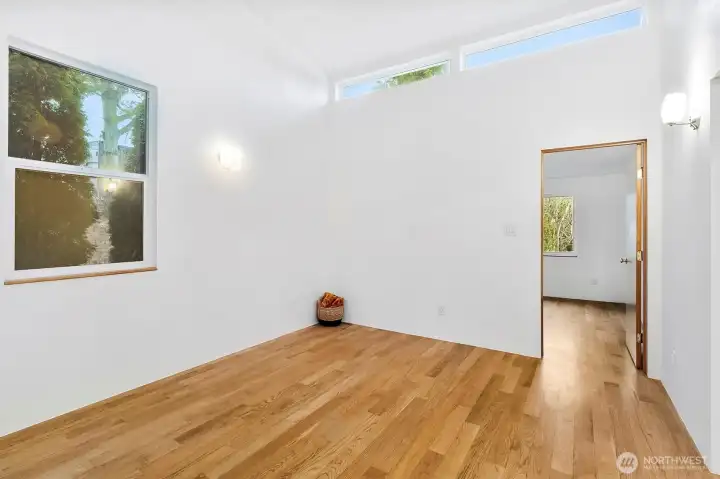 Light-filled living room with updated flooring and clean lines