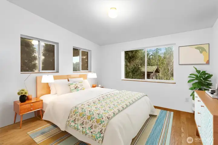 Virtually Staged- Bedroom #2- Primary bedroom off of the living room area