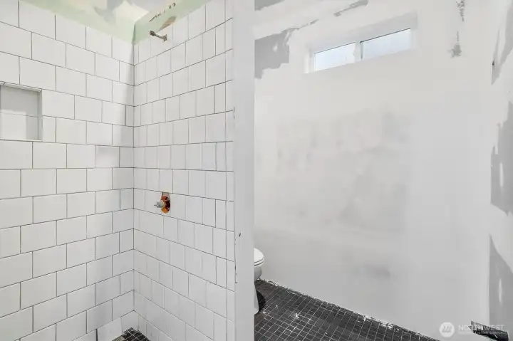 Unfinished bathroom in the detached garage ADU