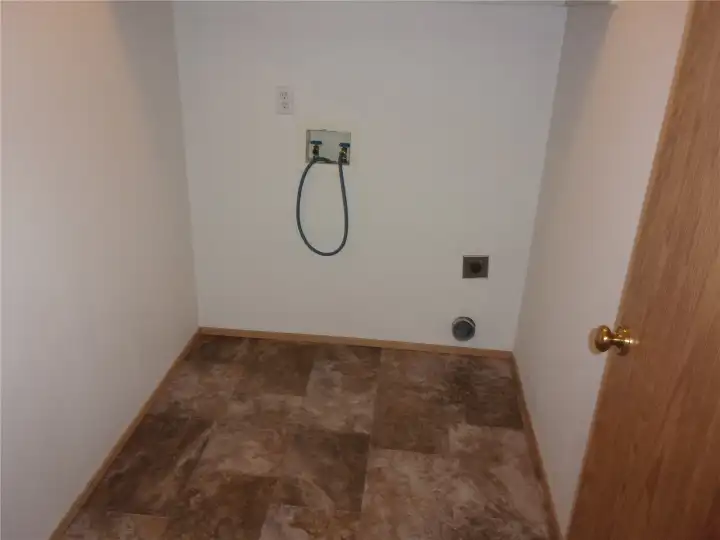Separate Laundry Room.