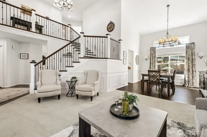 Seamless flow between living and dining areas, with soaring ceilings and elevated touches creating an inviting space for everyday living and entertaining.