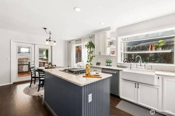 Slip out the French doors with the drinks & condiments - barbecue's on!