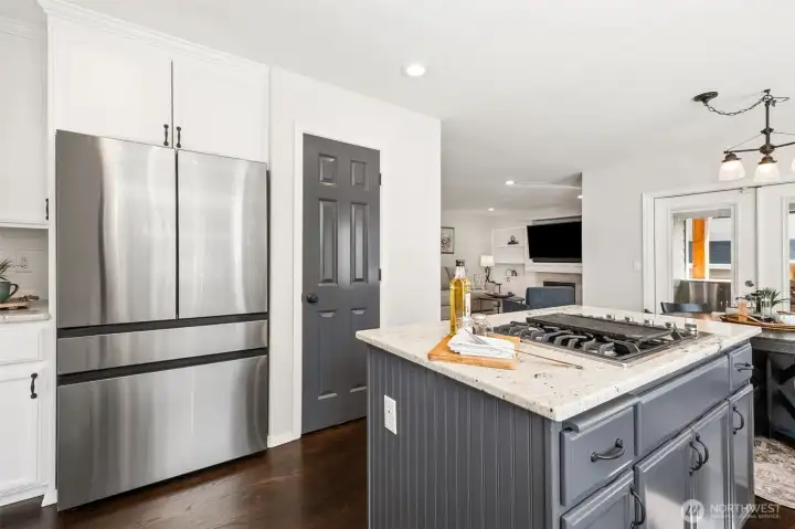 Enjoy a sleek, double-size stainless steel French door refrigerator, upgraded in 2023 and designed with a convenient large bottom freezer.