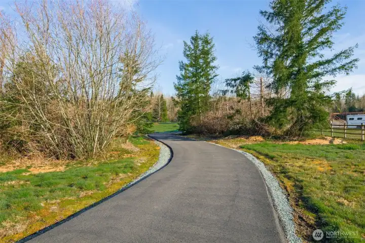 Entry drive - barndominium is barely visible