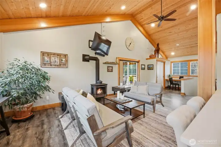 Living room showing slider to deck and office space