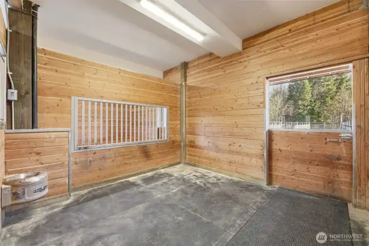 Fully matted 12'x12' box stalls with dutch doors, social panels, and automatic waterers