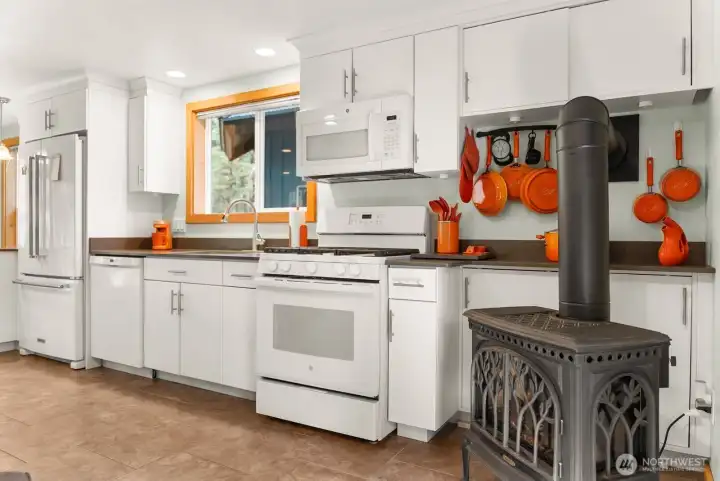Everything you need in a kitchen for your active lifestyle is here. Open floor plan accommodates gathering, eating, and more in a perfectly designing main level of this home.