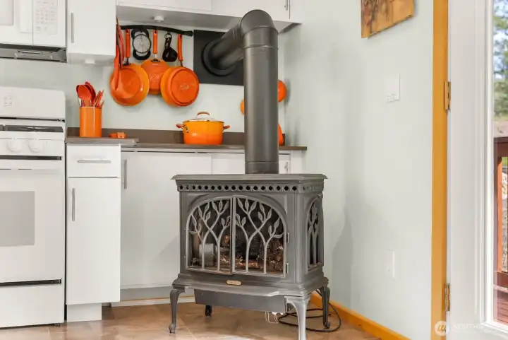 Freestanding propane stove warmth and beauty spreads to the mainlevel great open room and all who are in it!