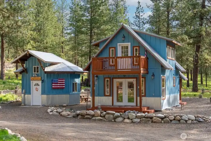 Cleverly designed tiny home and outbuilding Flex room.