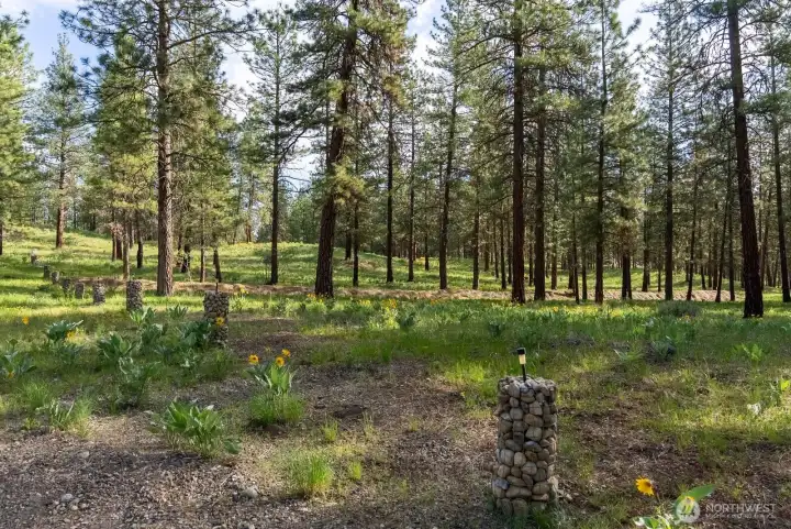 Rock gabeon marks property lines.