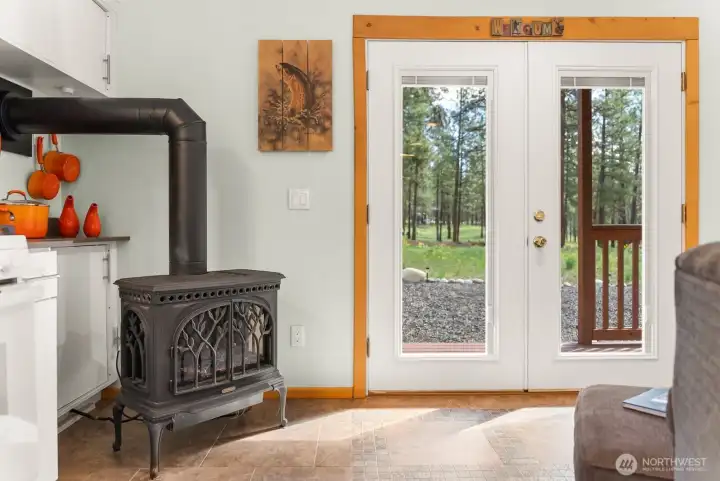 French doors open to back yard beauty.