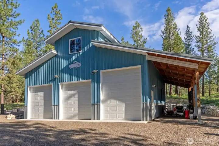 Solid Garage shop is 1440 sf with attached Lean to shed. Concrete slab-on-grade. Heated shop. 1/2 bath convenience. Loft storage.