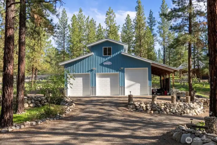 1440 sf Garage has 3 garage doors and 2 man doors.