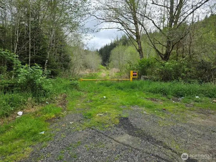 The property is located behind a locked gate at the end of Workman Creek Road.