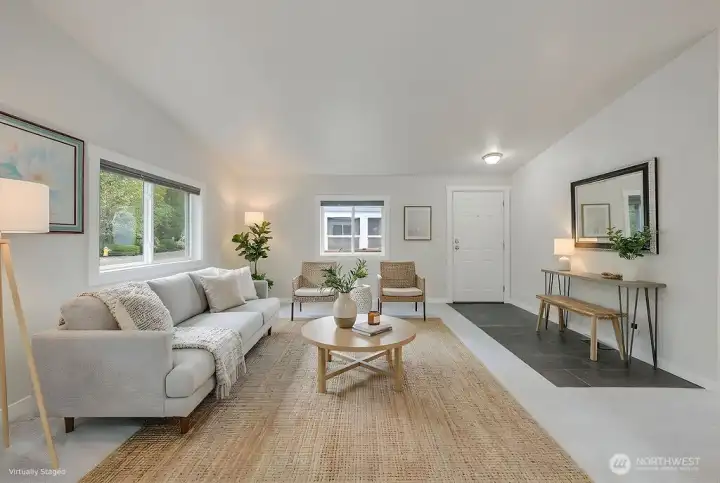Another view of the virtually staged living room with a different version of staging.