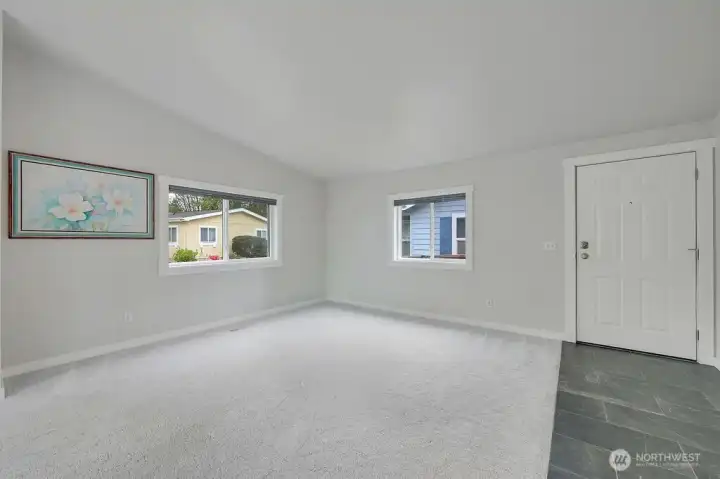 The corner windows allow lots of natural light into the living room.