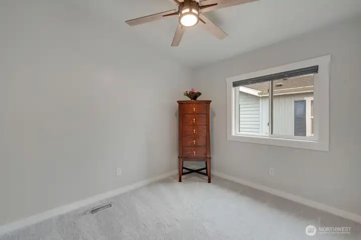 This is the 2nd guest bedroom. The big window provides lots of natural light.