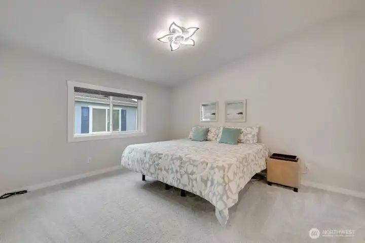 You will love the spacious primary suite, large enough to accommodate the largest of bedroom sets.