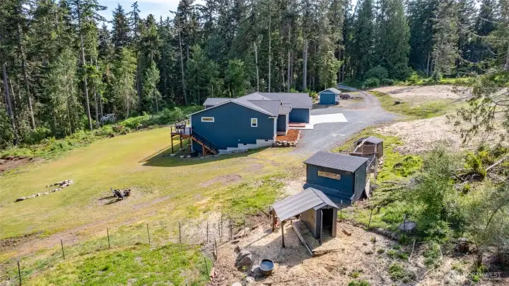Chicken coop and goat run or dog run. Room for two horses??