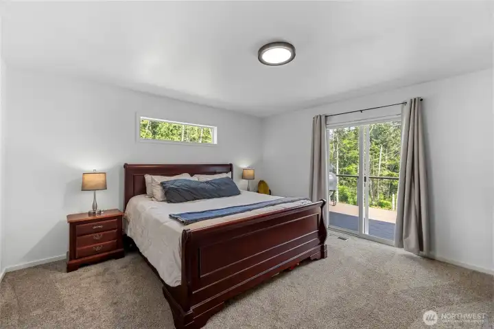 Primary bedroom is on one side of the house.