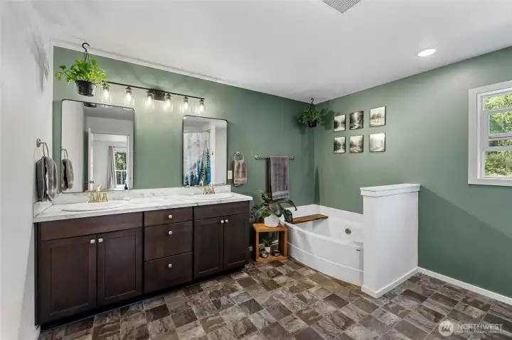 5 piece ensuite with walk in shower and soaker tub.