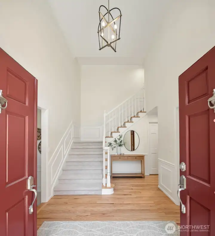 Grand entrance with refinished hardwood floors.