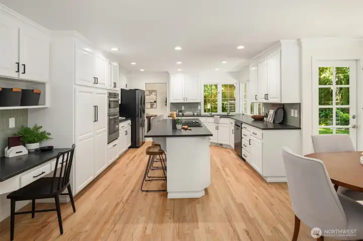 New granite countertops give the kitchen a sleek look.
