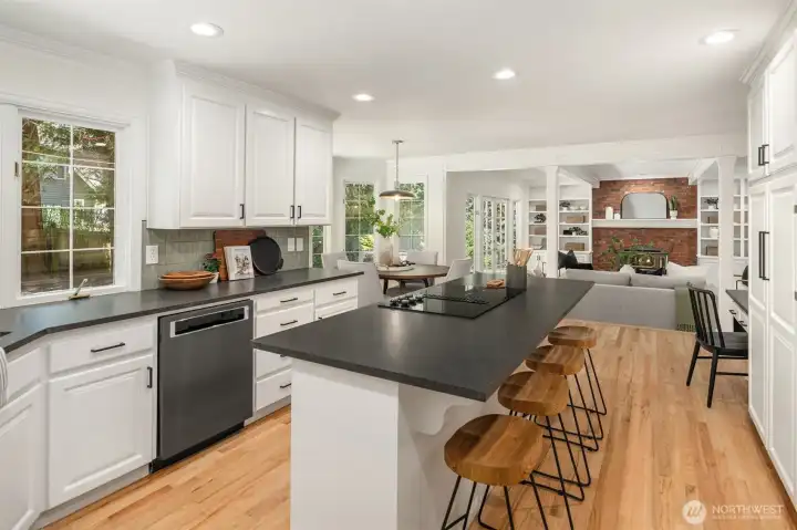 Black stainless appliances and new tile
