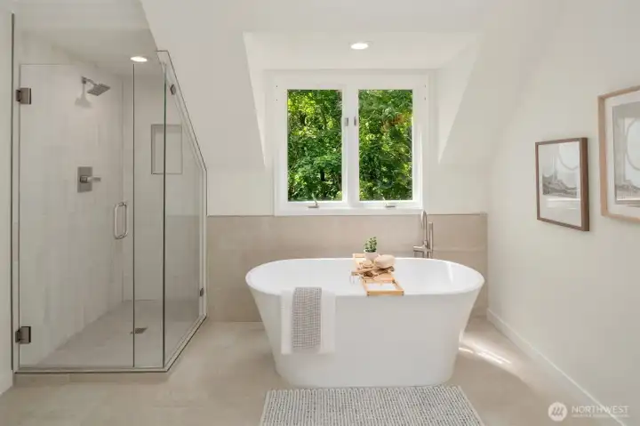 Spa-like primary bathroom with huge soaking tub to relax and unwind.