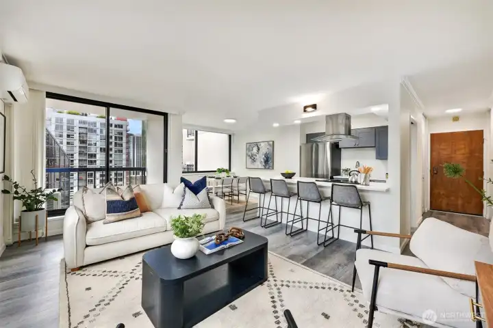 A previous owner opened up the former wall between kitchen & living areas making this space open & bright. A previous owner opened up the former wall between kitchen & living areas making this space open & bright.