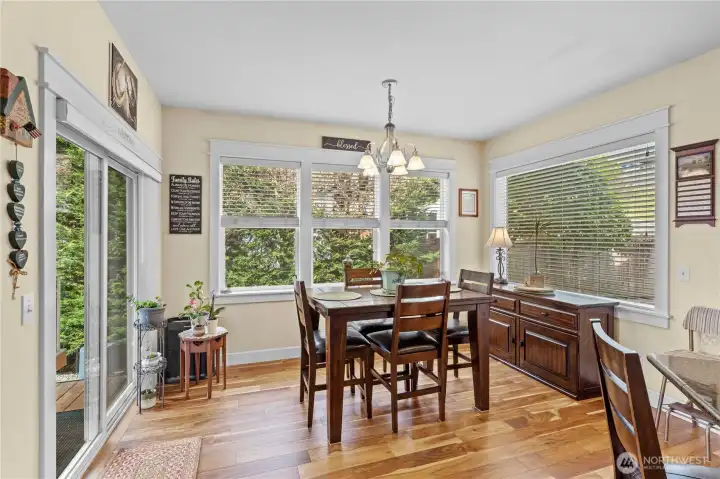 Dining Space located adjacent to the Kitchen with Hardwoods and Slider to Deck!