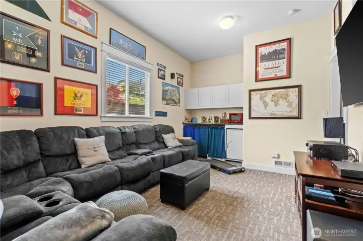 Sports Cave! Bonus Room is a hidden area with a 'bar' area complete with cabinets and fridge!