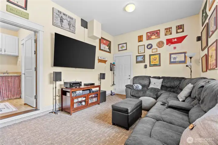 Sports Cave, other view. Door on Right leads to Backyard. Other doorway leads into Laundry then Kitchen.