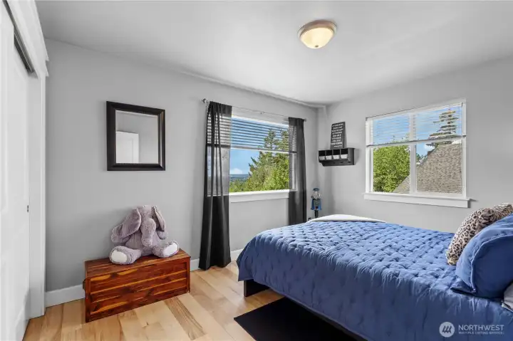 At the Top of the Stairs to the right is Bedroom #1. Views all the way to Puget Sound!