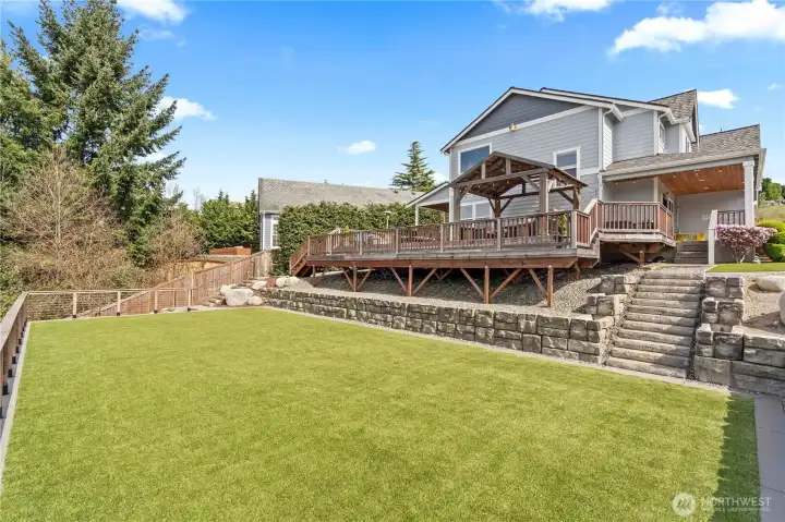 From the Terraced Turf Yard looking up at the house. Top Dog Turf professionally installed this lawn in 2025.