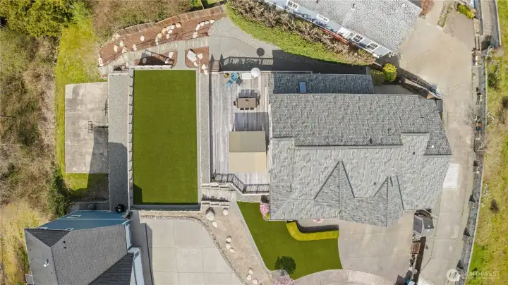 Overhead View of the Home, Deck, Lawns, Sport Court and Terraced Yards.