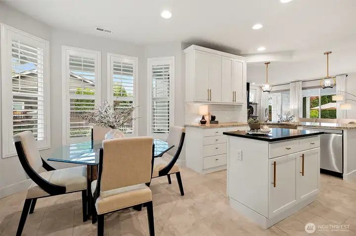 Breakfast nook w/ planatation shutters.