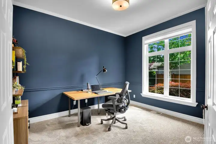 Spacious main floor office/den. Spacious main floor office/den.