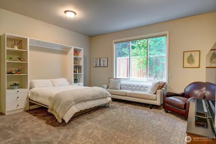 Main Floor guest suite/2nd family room with Queen sized Murphy Bed deployed. Main Floor guest suite/2nd family room with Queen sized Murphy Bed deployed.