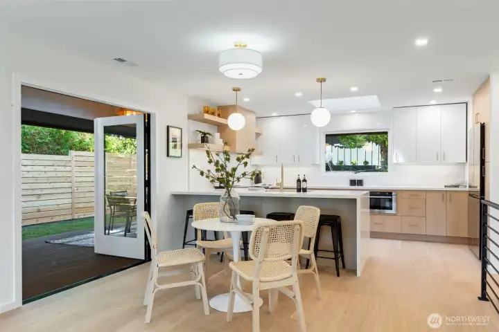 Dining area that opens to backyard through French doors. Dining area that opens to backyard through French doors.