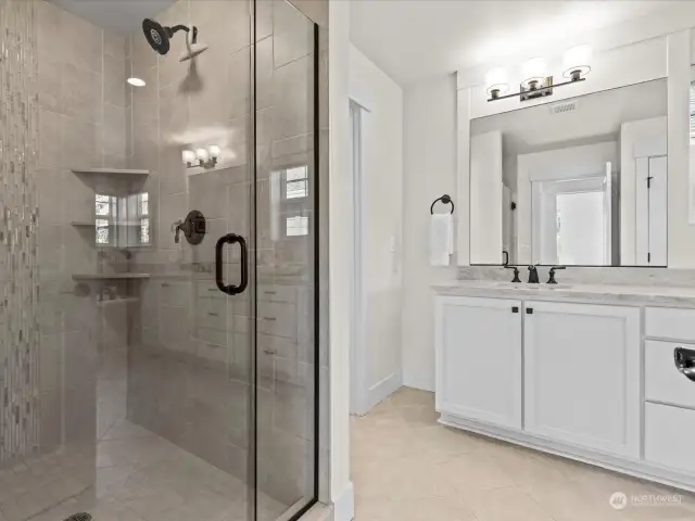 upgraded and oversized shower in primary bath.