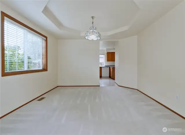 Dining Room Features a Coffered Ceiling