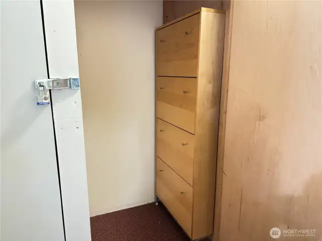 Bonus storage space located across hall from condo.