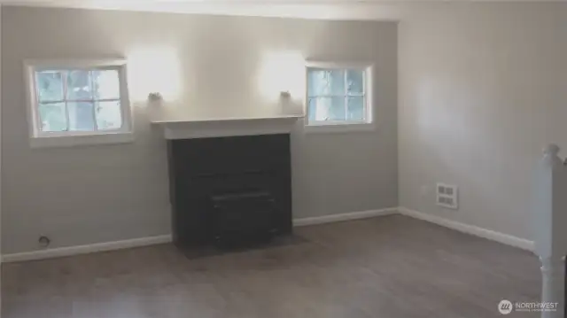 Interior Photo from 2014 of the Living room. Refinished hardwood floors, fireplace walls and trim. Sorry for the bad pic... Its all I got